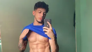 Junior Olioti is a Tattooed Hunk We're Following on Social Media